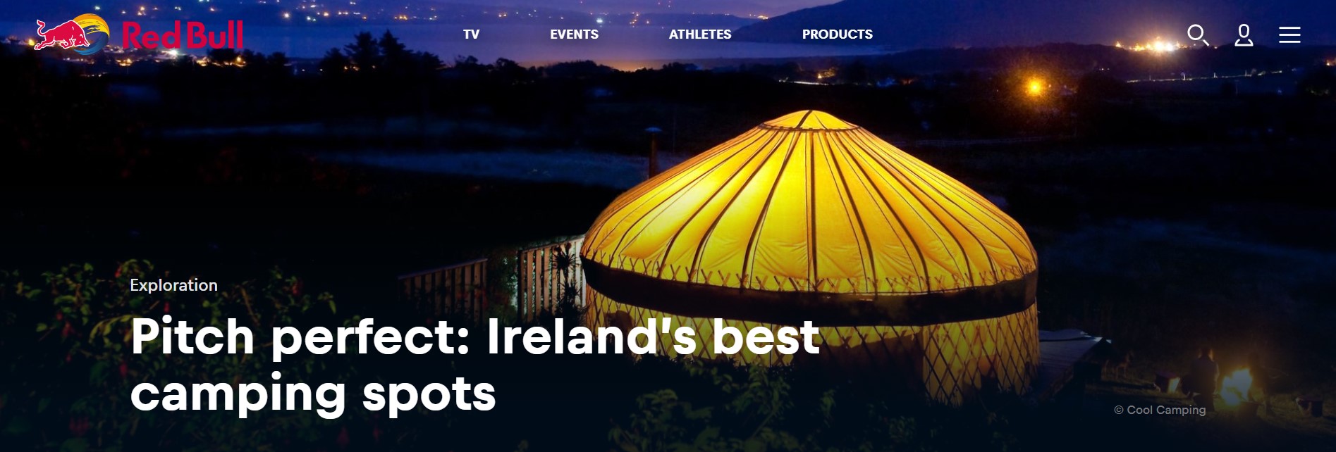 Image of large yurt at night with Lough Swilly Bay and Knockalla mountain in the background